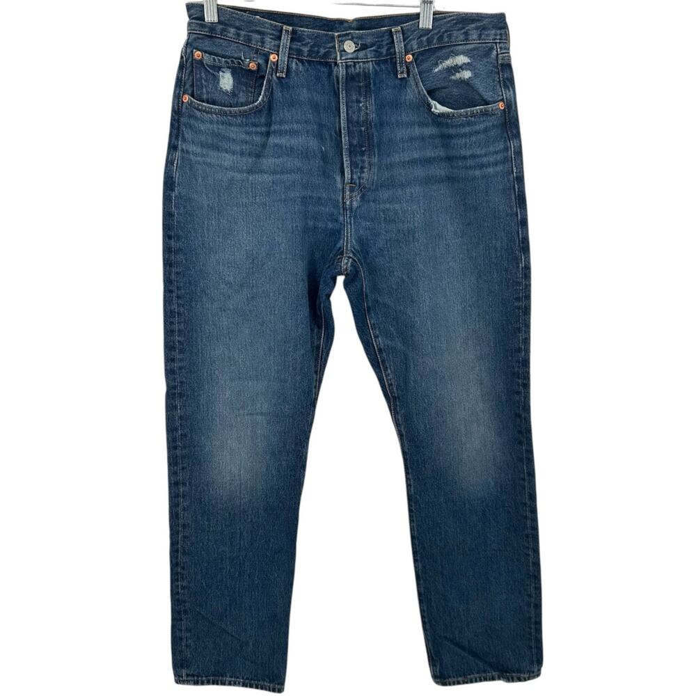 Vintage style levi's premium 501 button fly distressed blue denim straight jeans
